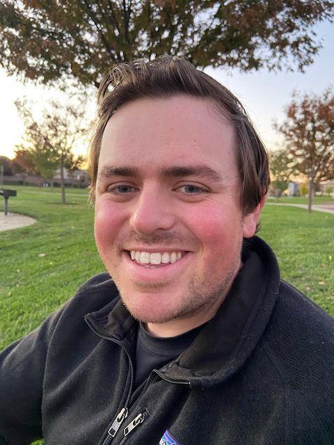 Josh Idler headshot outside